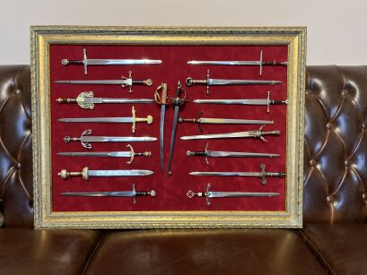 LARGE FRAME AND 24 SWORDS from different eras (019)